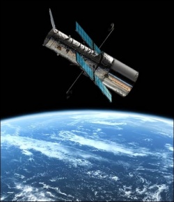 Figure 5.18. An artist’s impression of the NASA/ESA Hubble Space Telescope in orbit above the Earth (Courtesy of NASA).