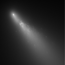 Figure 5.6. A Hubble Space telescope image of the comet Schwassmann-Wachmann 3, breaking up into smaller pieces as it approached the Sun, taken in April 2006 (Courtesy of NASA).