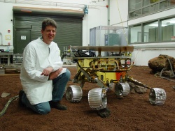 Figure 3.7. Rob Grover with a Mars Exploration Rover engineering model