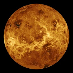 Figure 5.4. A global view of Venus composed of numerous Magellan images obtained using the synthetic aperture radar (at centimeter wavelengths), which penetrates through the very thick atmosphere and clouds. The surface exhibits complex geological patterns involving widespread volcanic activity, extension-compression processes, faulting, fractures and other powerful crustal deformations. (Courtesy of NASA)
