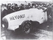 The 1931 Paul Heylandt rocket car at Tempelhof airfield. Alfons Pietsch at left in car.